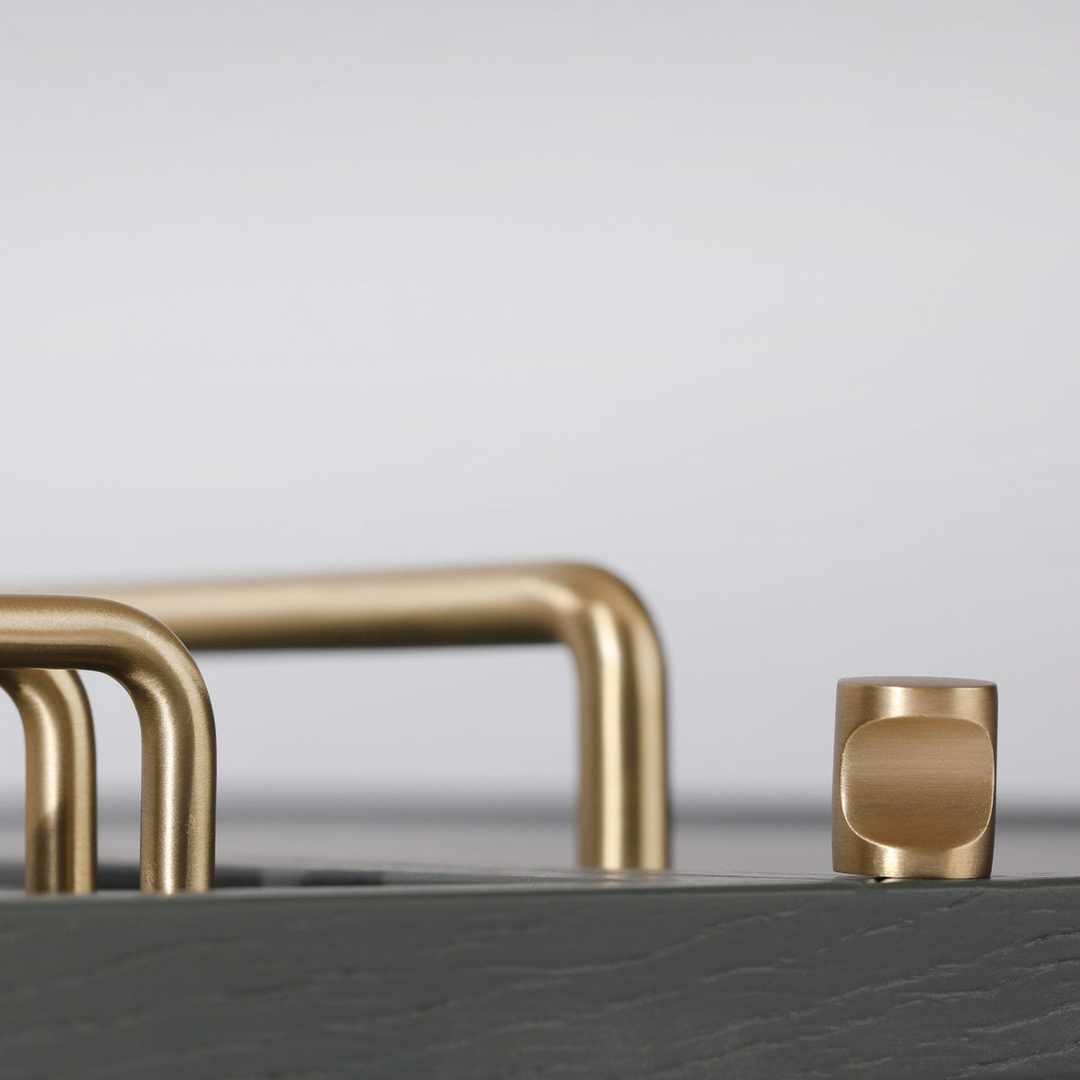 Ren Knob in burnished brass fitted to cabinetry
