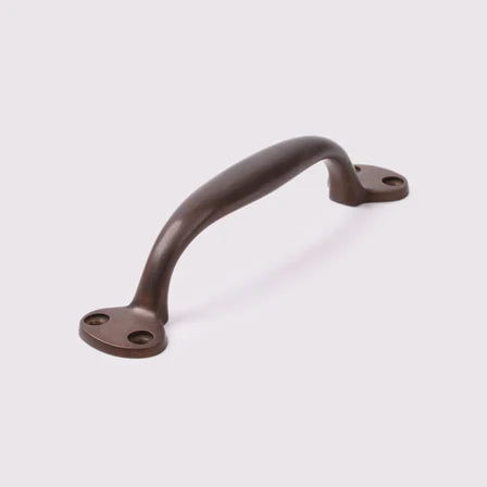 Highland Handle in antique bronze by Hepburn Hardware