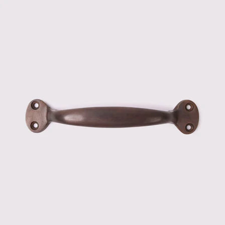 Highland Handle in antique bronze fitted to cabinetry