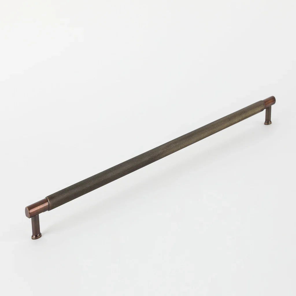 New Yorker Appliance Pull in oil rubbed bronze fitted to cabinetry