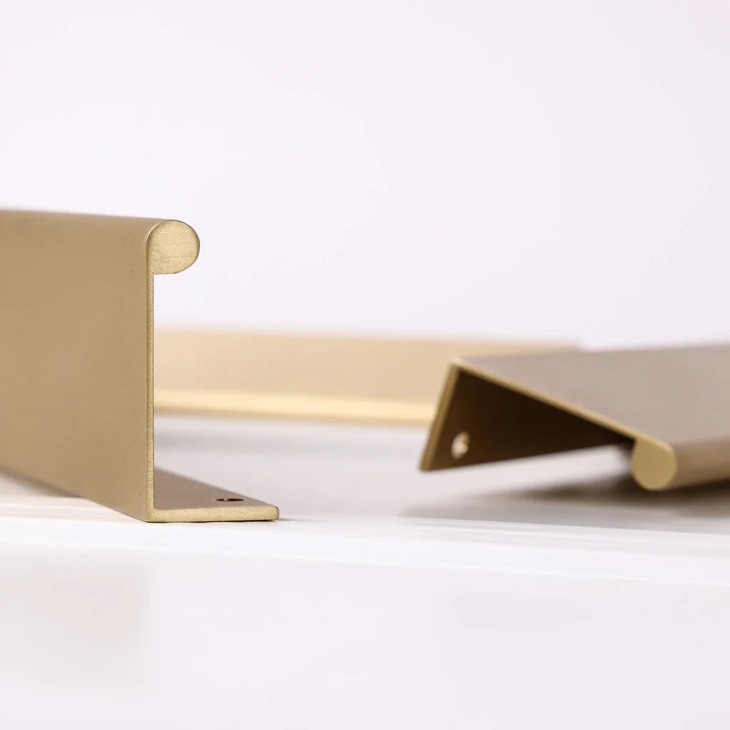 Ren Lip Pull in burnished brass fitted to a drawer