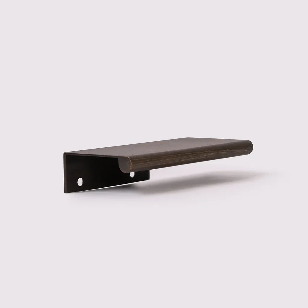 Ren Lip Pull in English bronze fitted to a drawer
