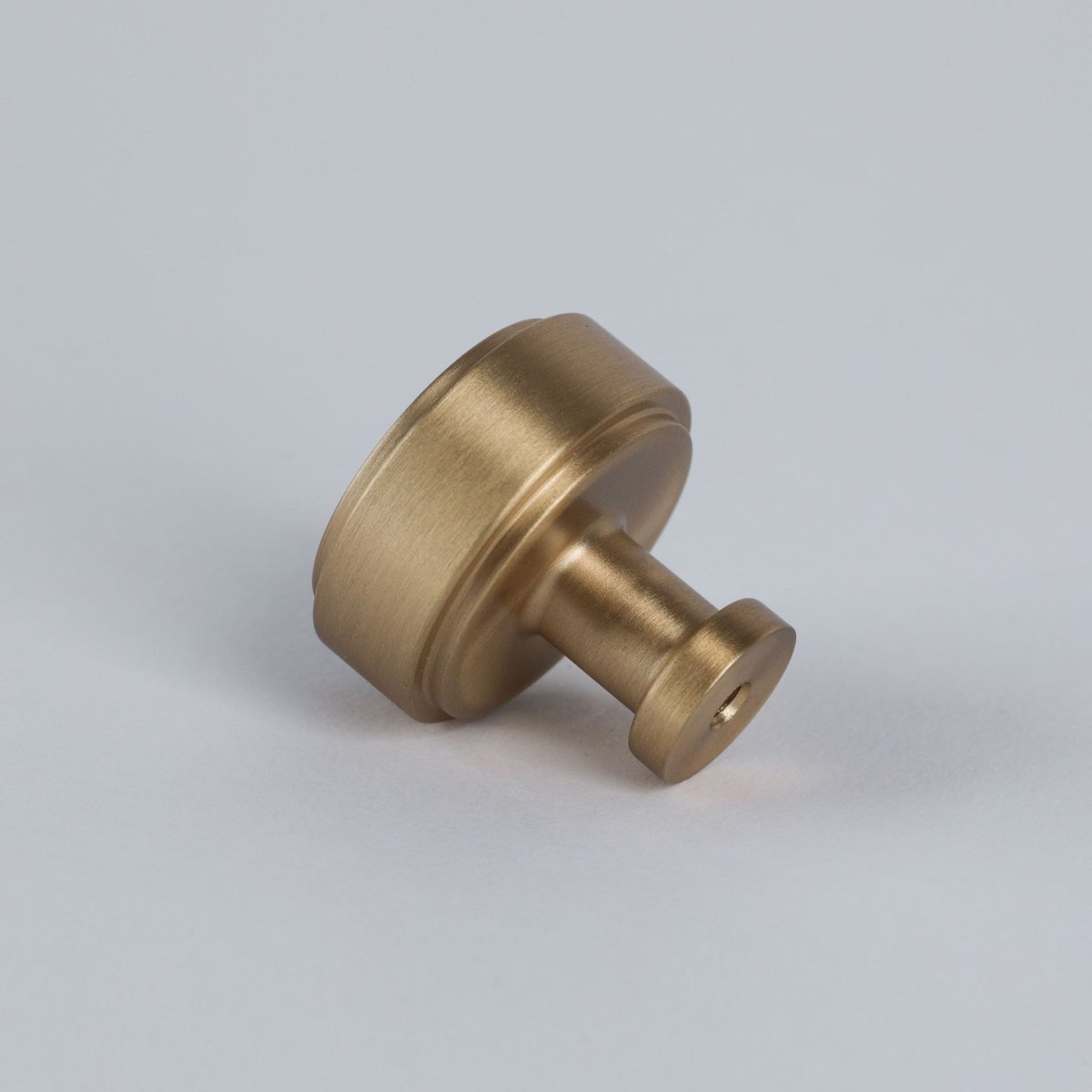 Georgia Knob in burnished brass fitted to cabinetry