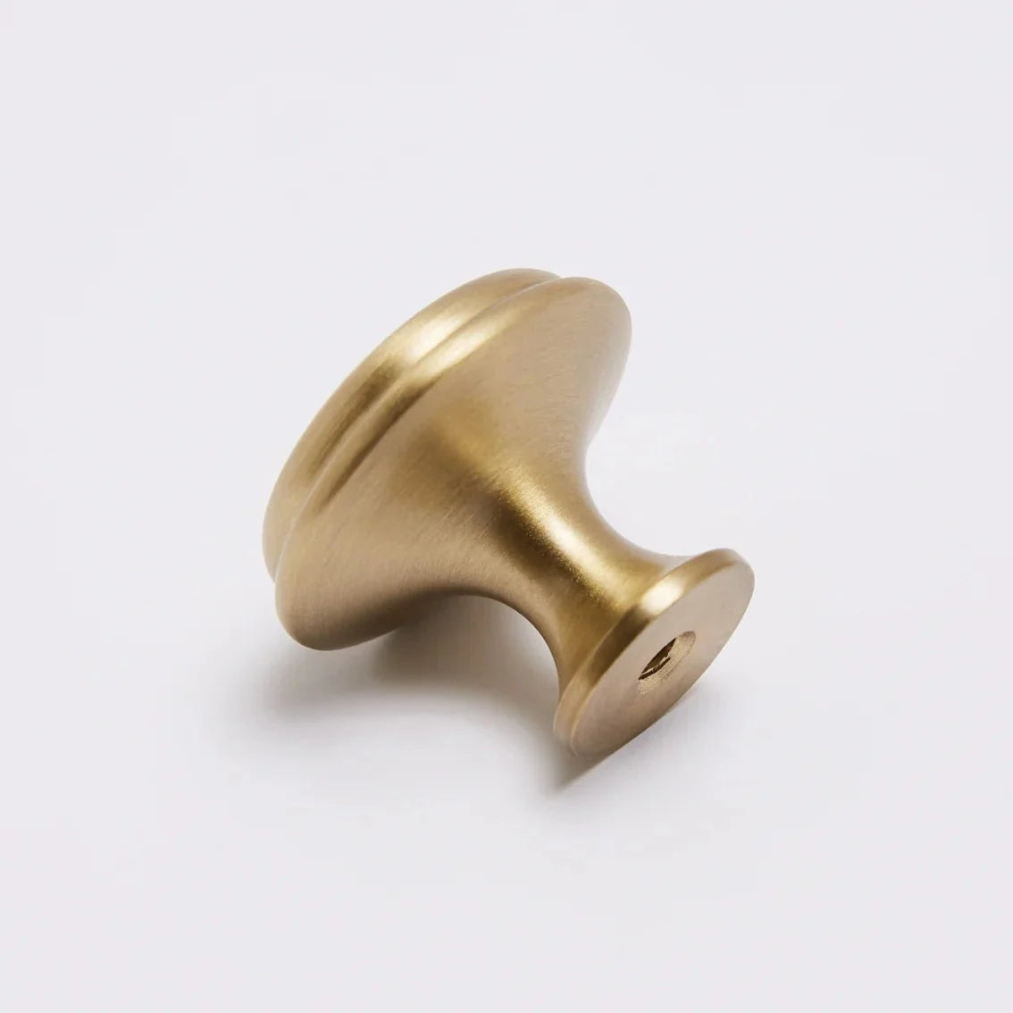 Halifax Knob in burnished brass fitted to cabinetry