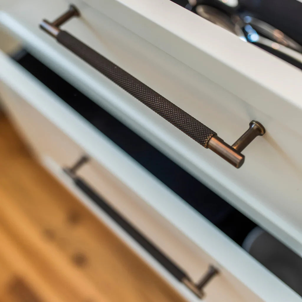 New Yorker Handle in oil rubbed bronze fitted to cabinetry