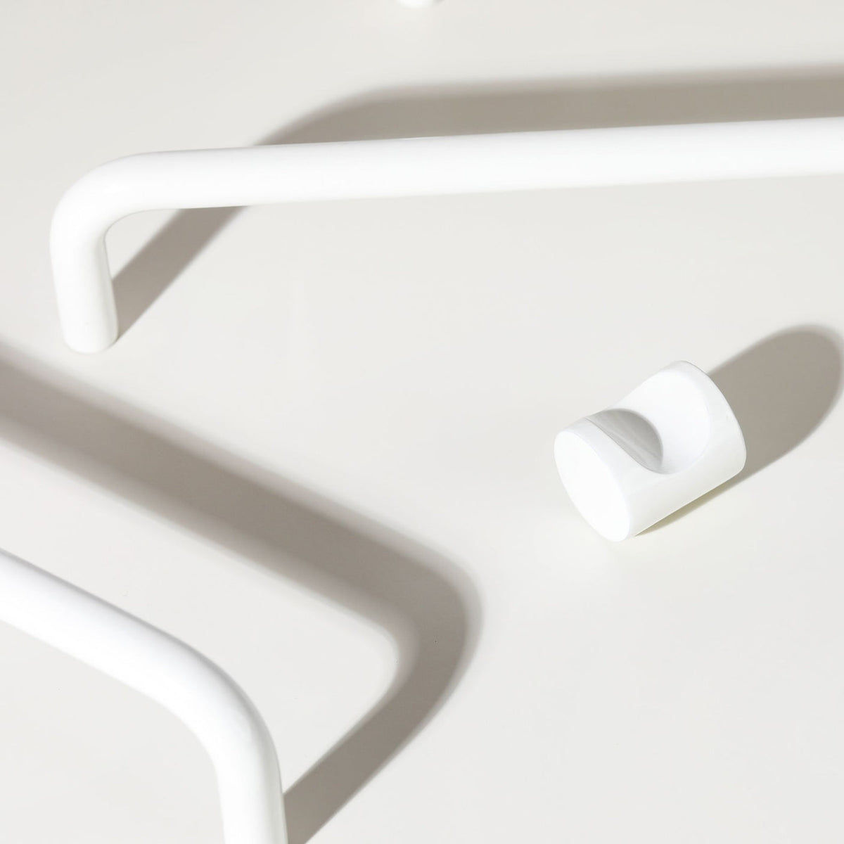 Ren Knob in white fitted to cabinetry