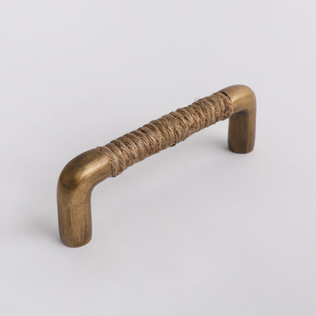 Rope Handle in jute with acid washed brass by Hepburn Hardware