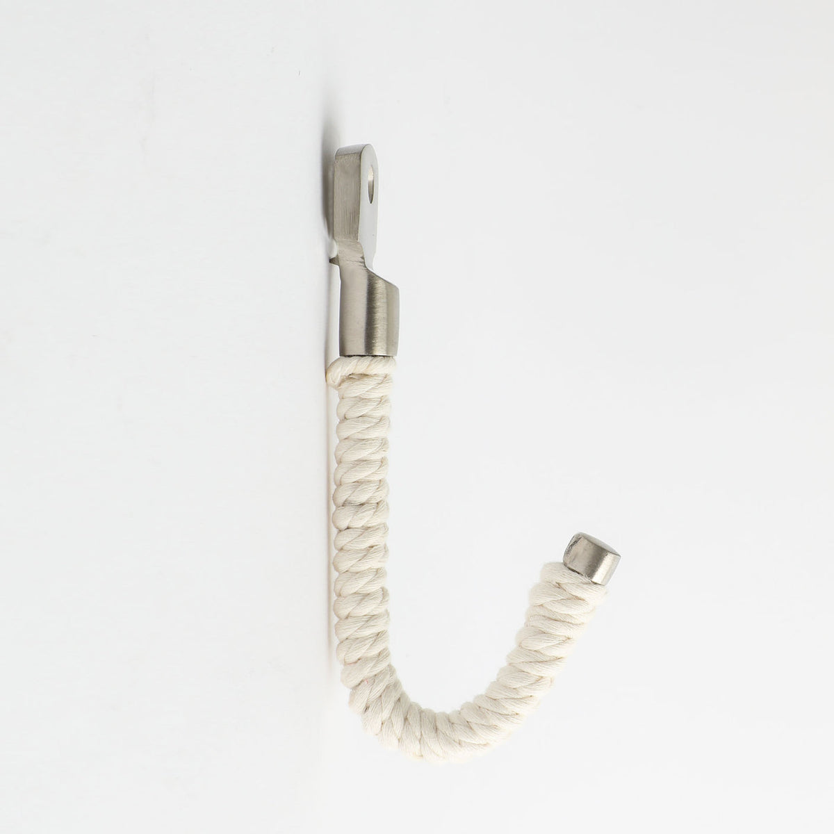 White cotton rope hook fitted to a wall