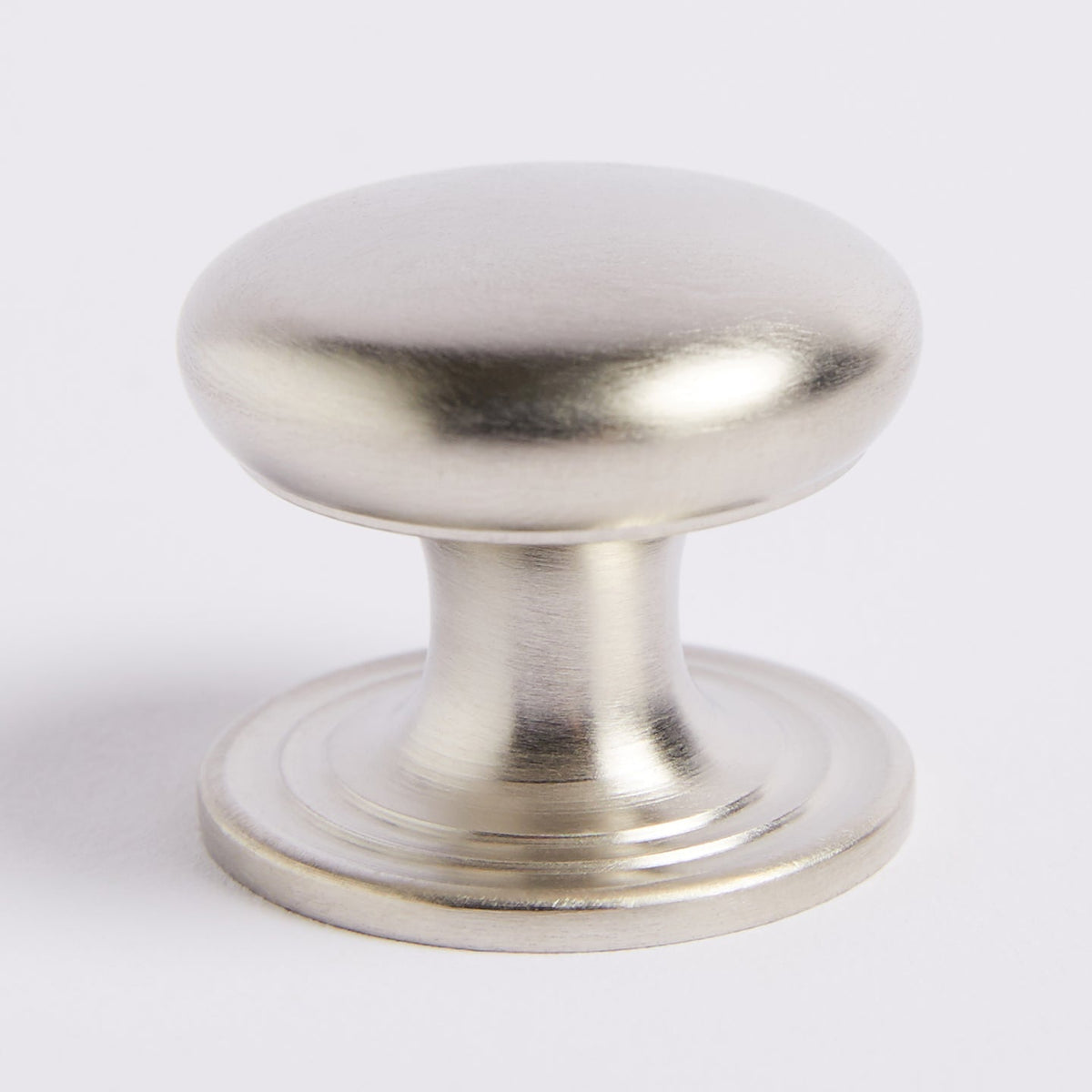 Kew Knob in satin nickel fitted to cabinetry