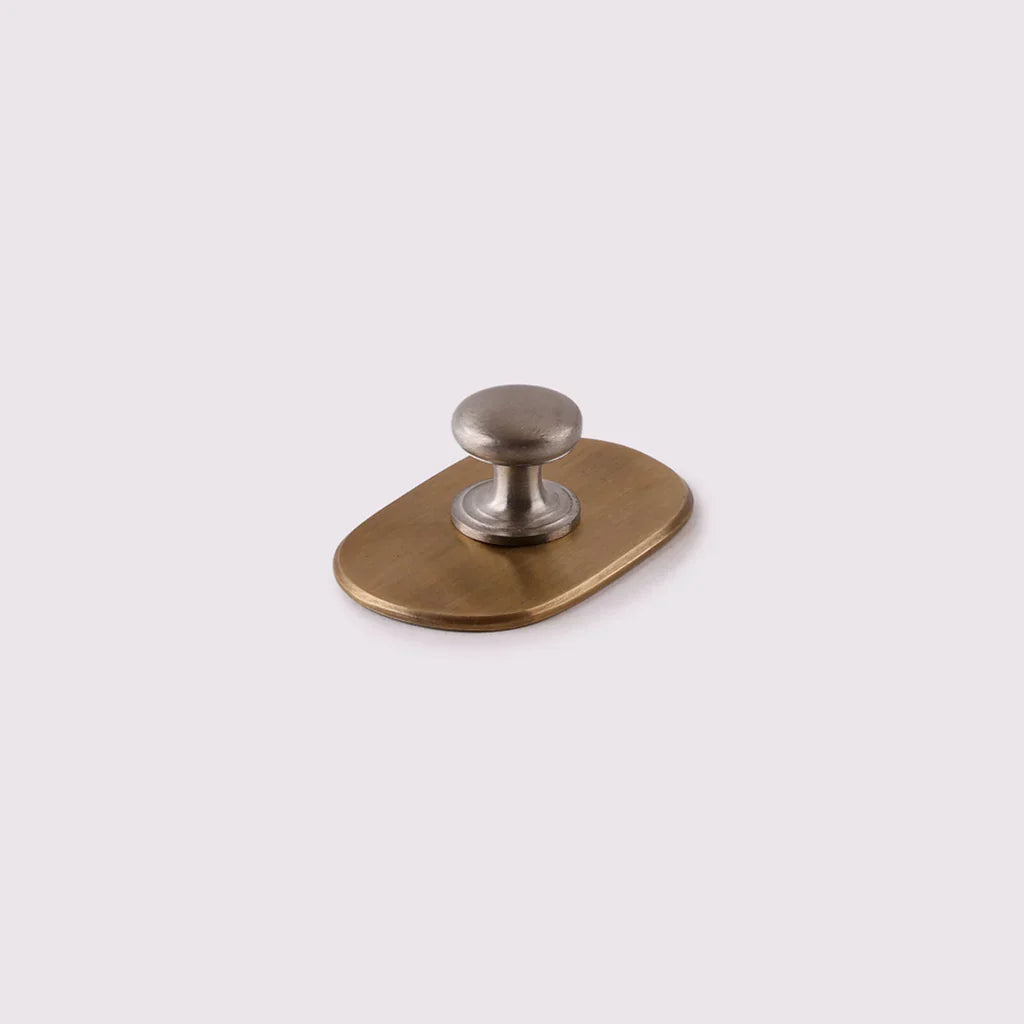 Curved Knob Backplate in acid wash brass by Hepburn Hardware