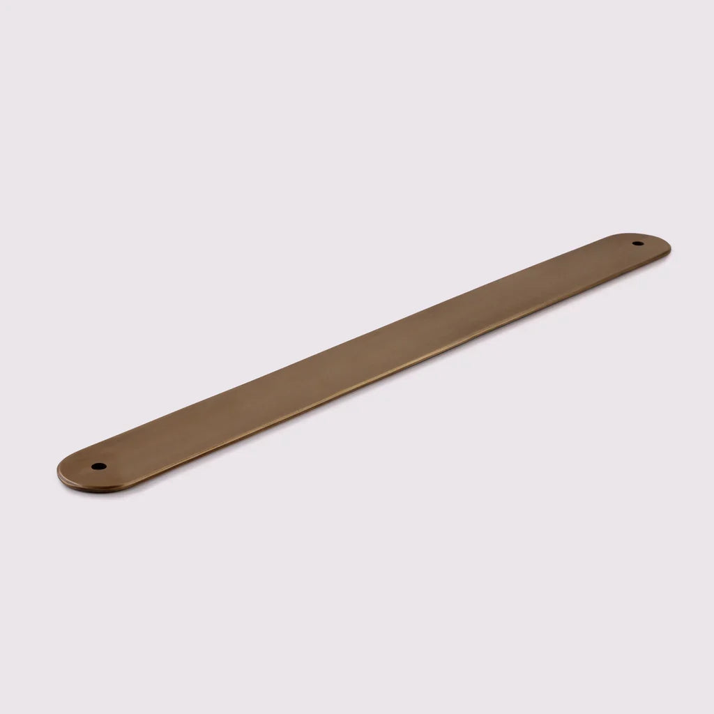 Curved Appliance Pull Backplate in acid wash brass by Hepburn Hardware