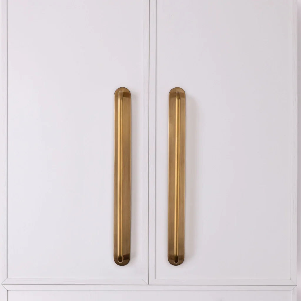 Curved Appliance Pull Backplate fitted to cabinetry