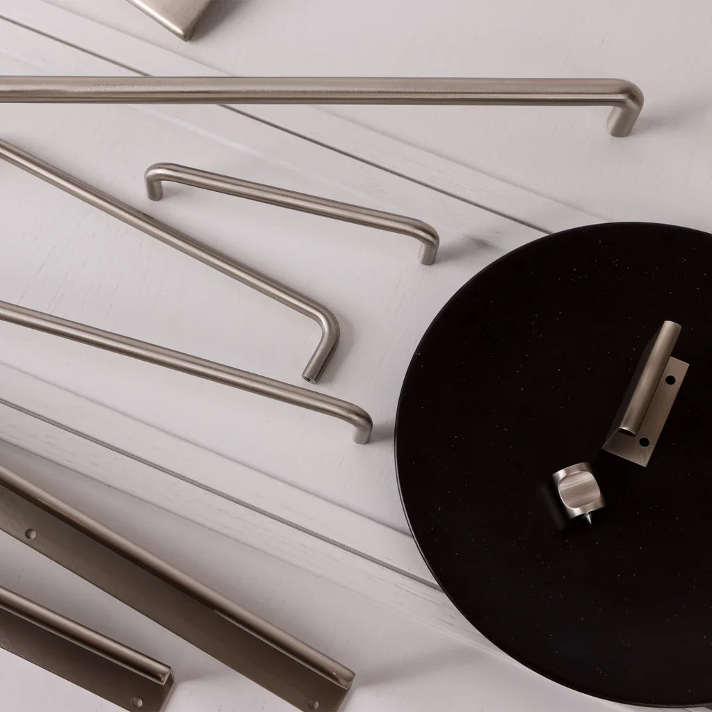 Ren Knob in satin nickel fitted to cabinetry
