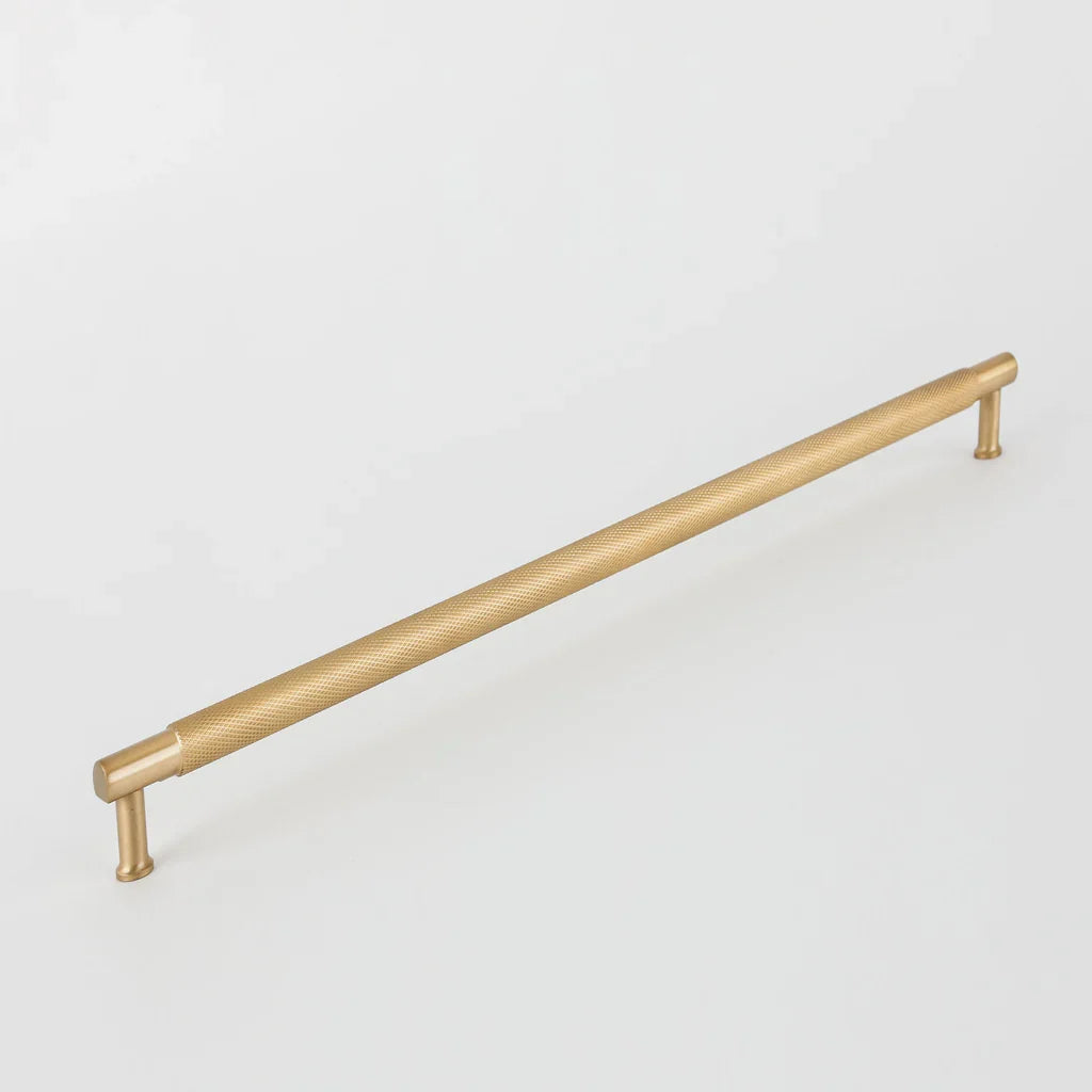 New Yorker Appliance Pull in burnished brass fitted to integrated cabinetry