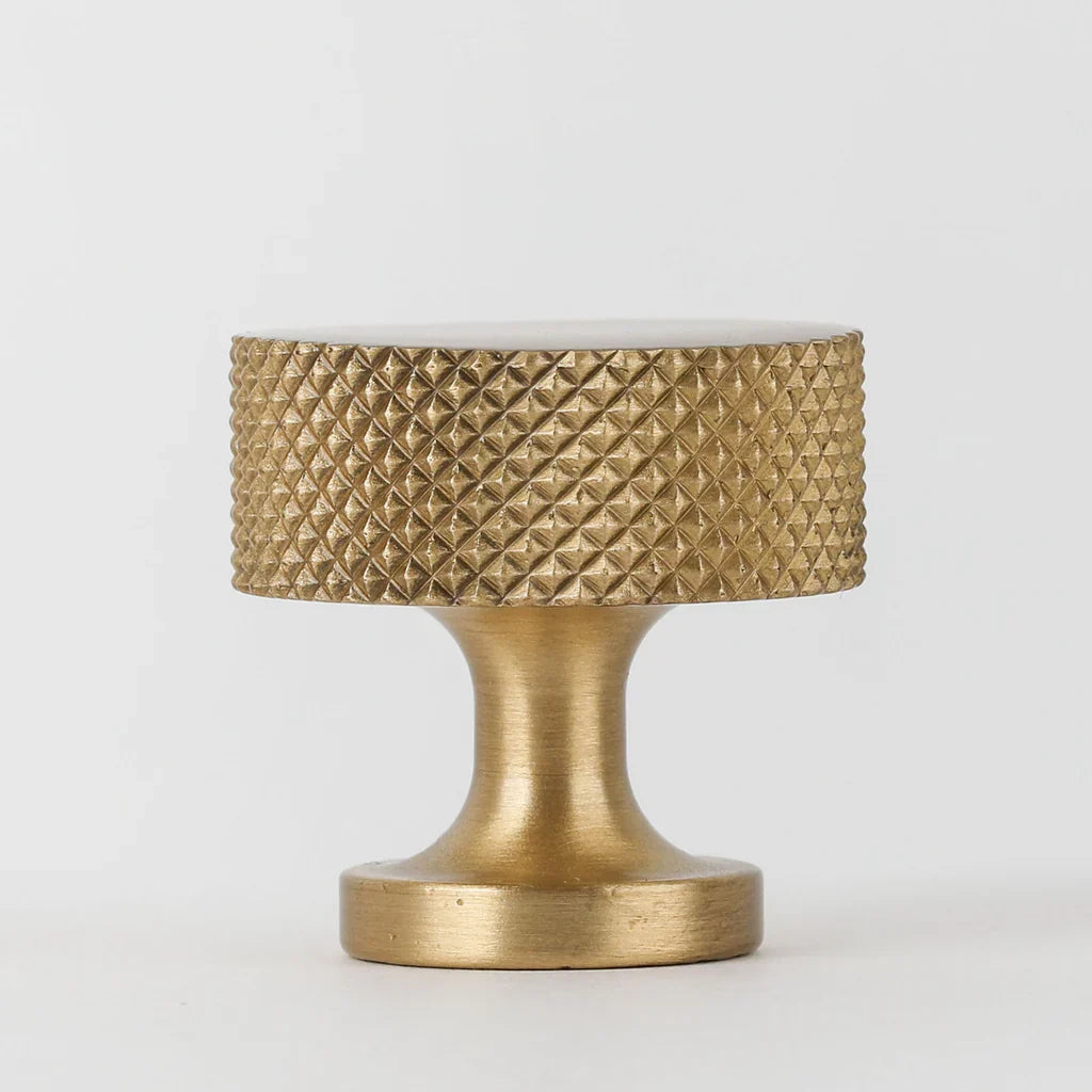 New Yorker Knob in burnished brass fitted to cabinetry