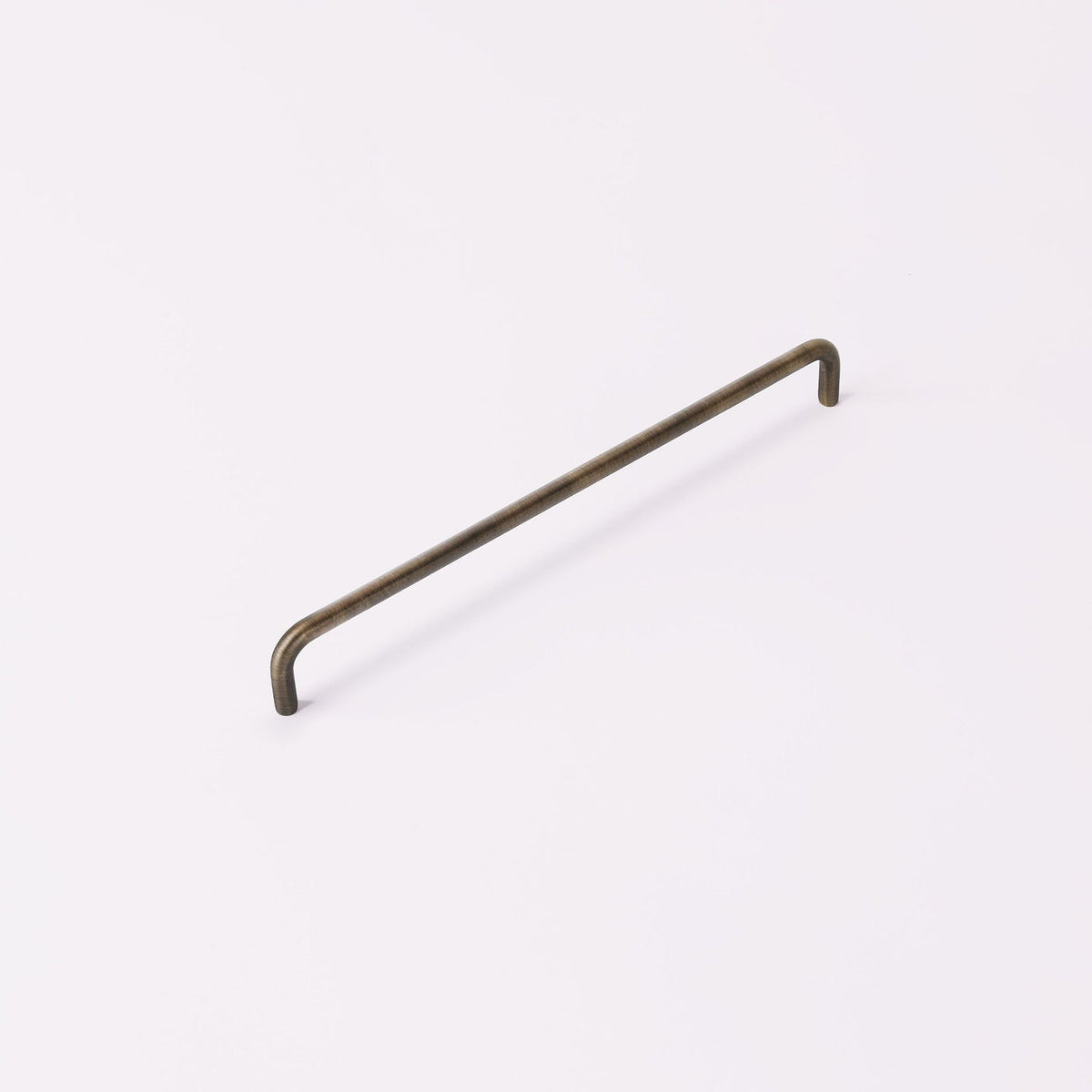 Ren Handle in English bronze fitted to cabinetry