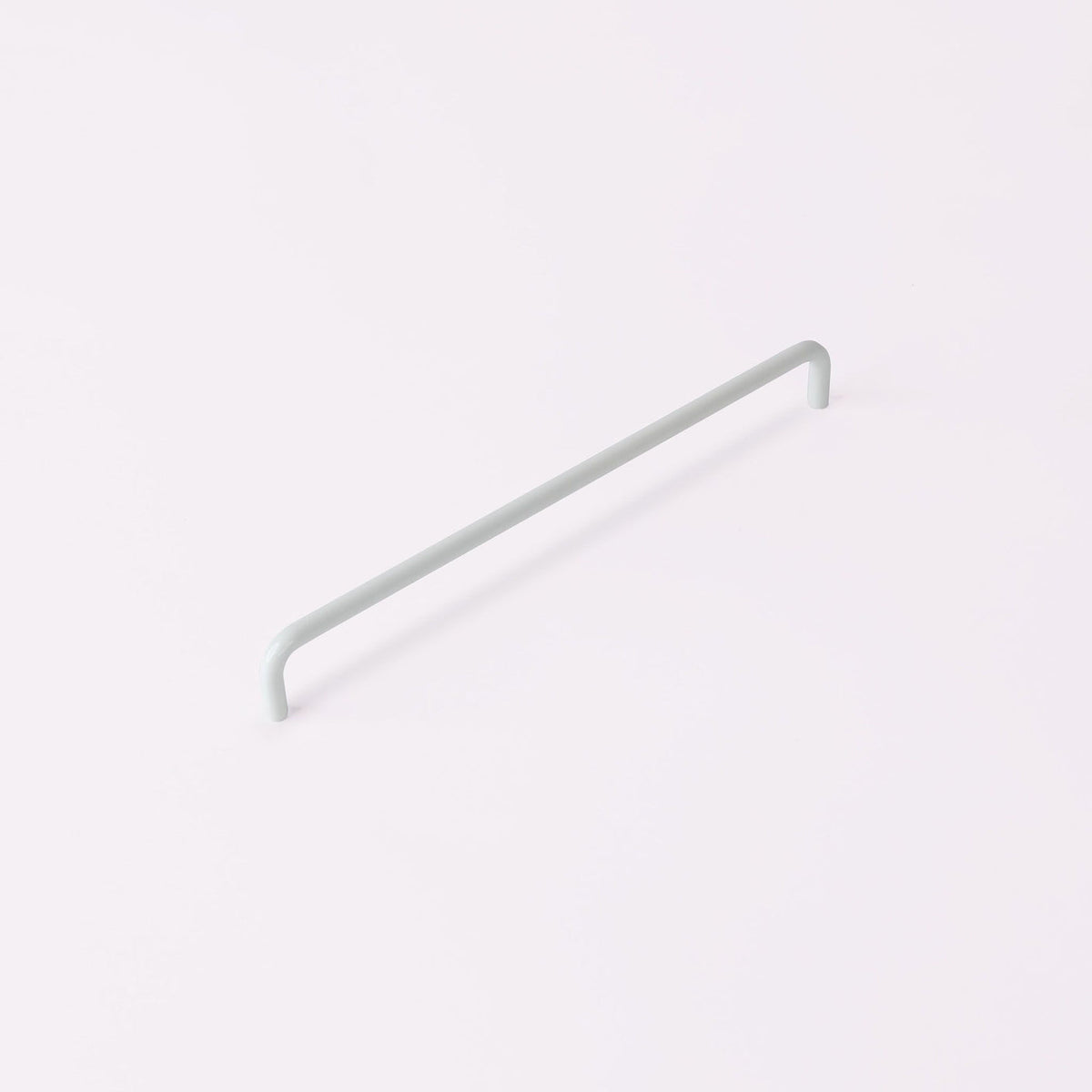 Ren Handle in white fitted to cabinetry